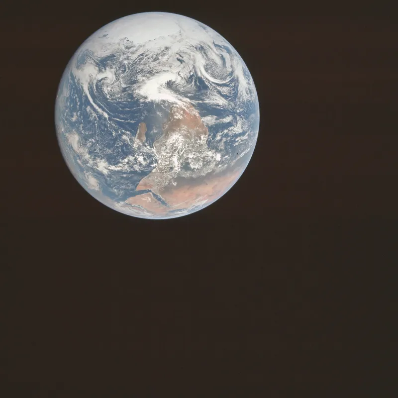 The Apollo 17 'Blue Marble' photograph of the whole Earth against black space, in its original as-shot orientation with the Antarctic ice cap uppermost and Africa below