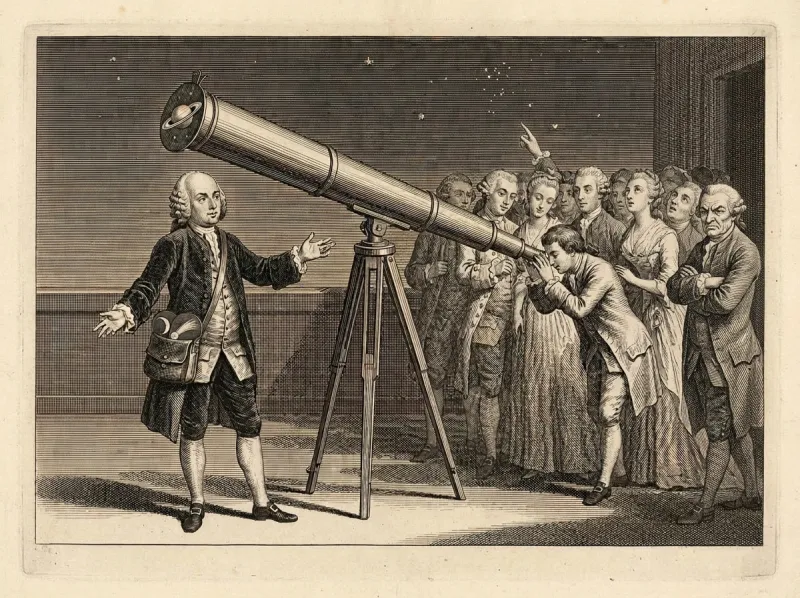 An 18th-century engraving: a showman in a half-bald wig gestures beside a tall telescope angled toward the viewer, a painted Saturn card clipped over its front aperture and a satchel of painted celestial discs at his hip; a finely dressed crowd peers through the eyepiece on the far side, one older man among them scowling with folded arms